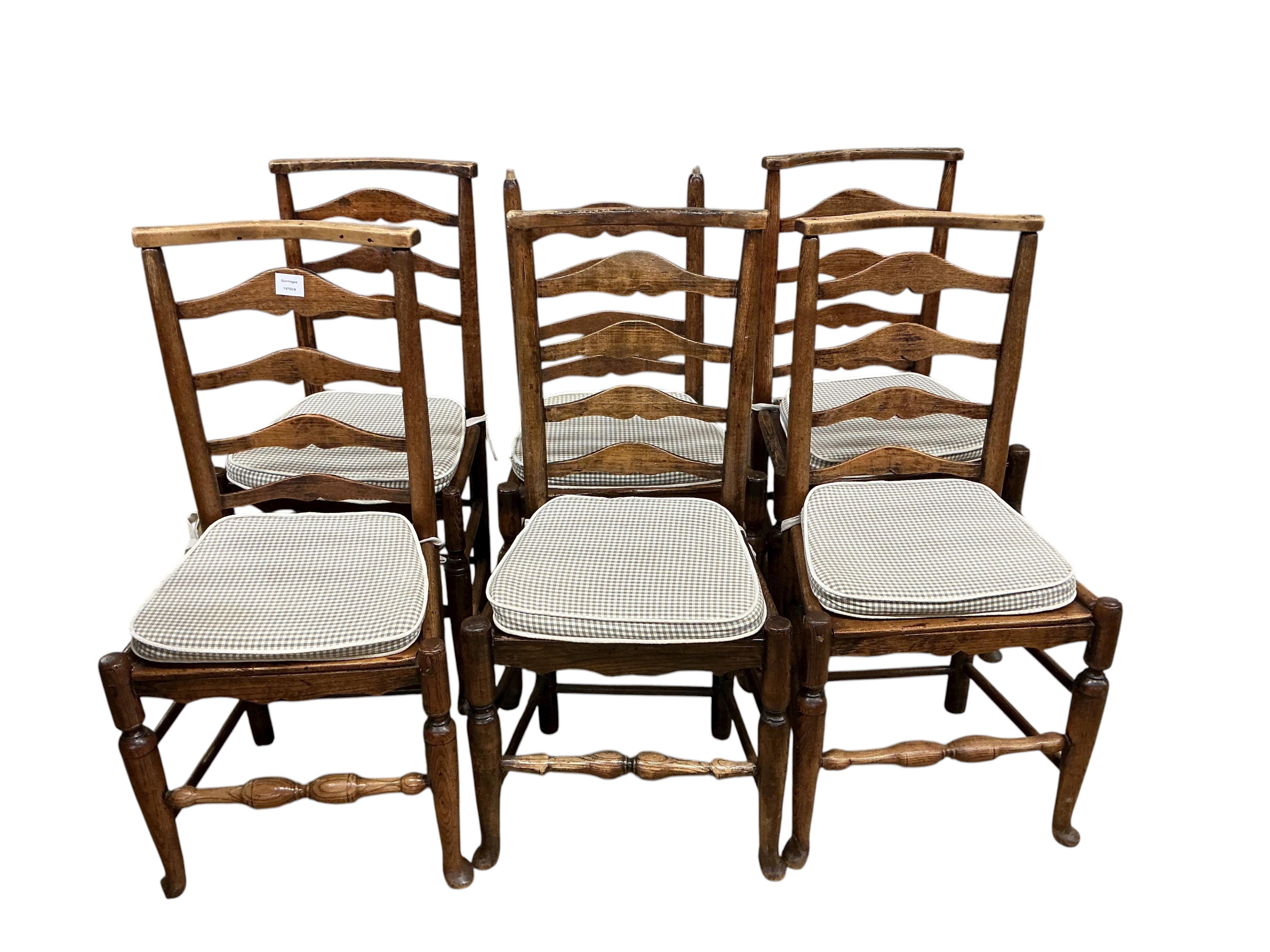 A harlequin set of six early 19th century Provincial ash and elm ladderback rush seated dining chairs (a.f.)